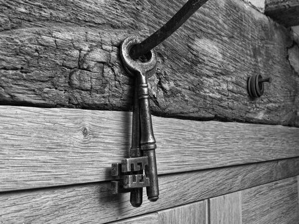 Old keys hanging on nail