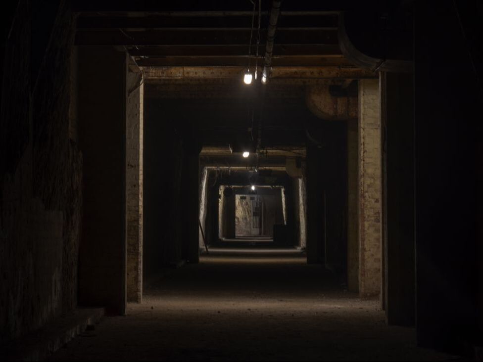 underground dimly lit tunnel