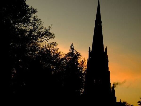 church silhouette at sunset
