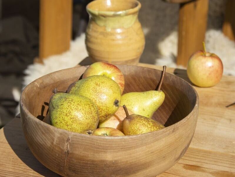 pears in a wooden bowl